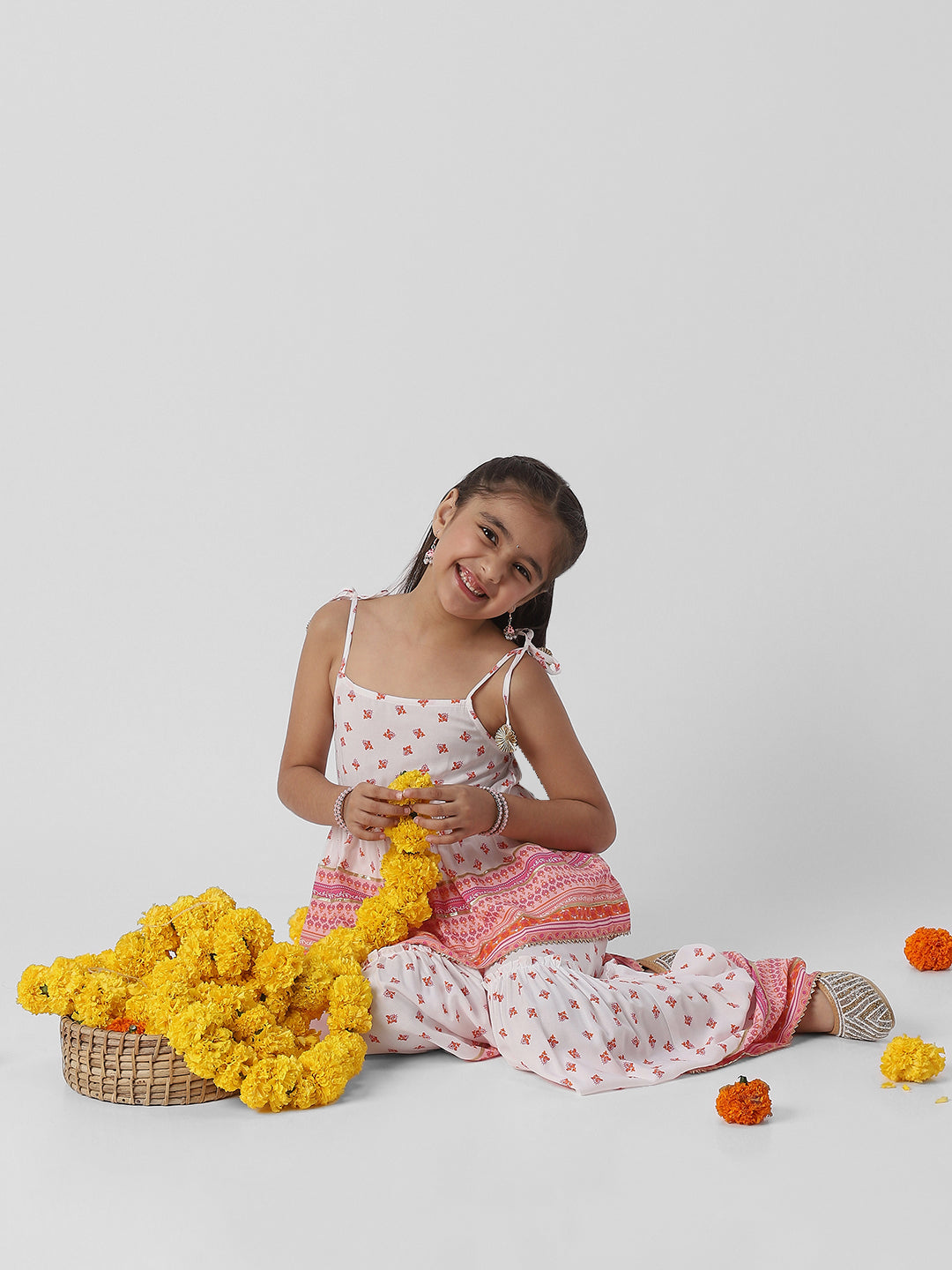 Nautinati Girls Block Print Fusion Set With Tassels, Gota Trims and Flared Silhouette