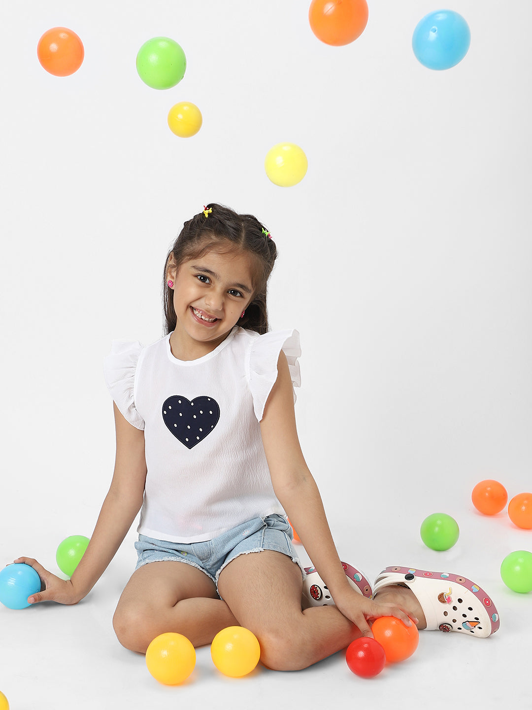 Nautinati Girls White Frill Sleeve Everyday Wear Crepe Top With Navy Heart Patch