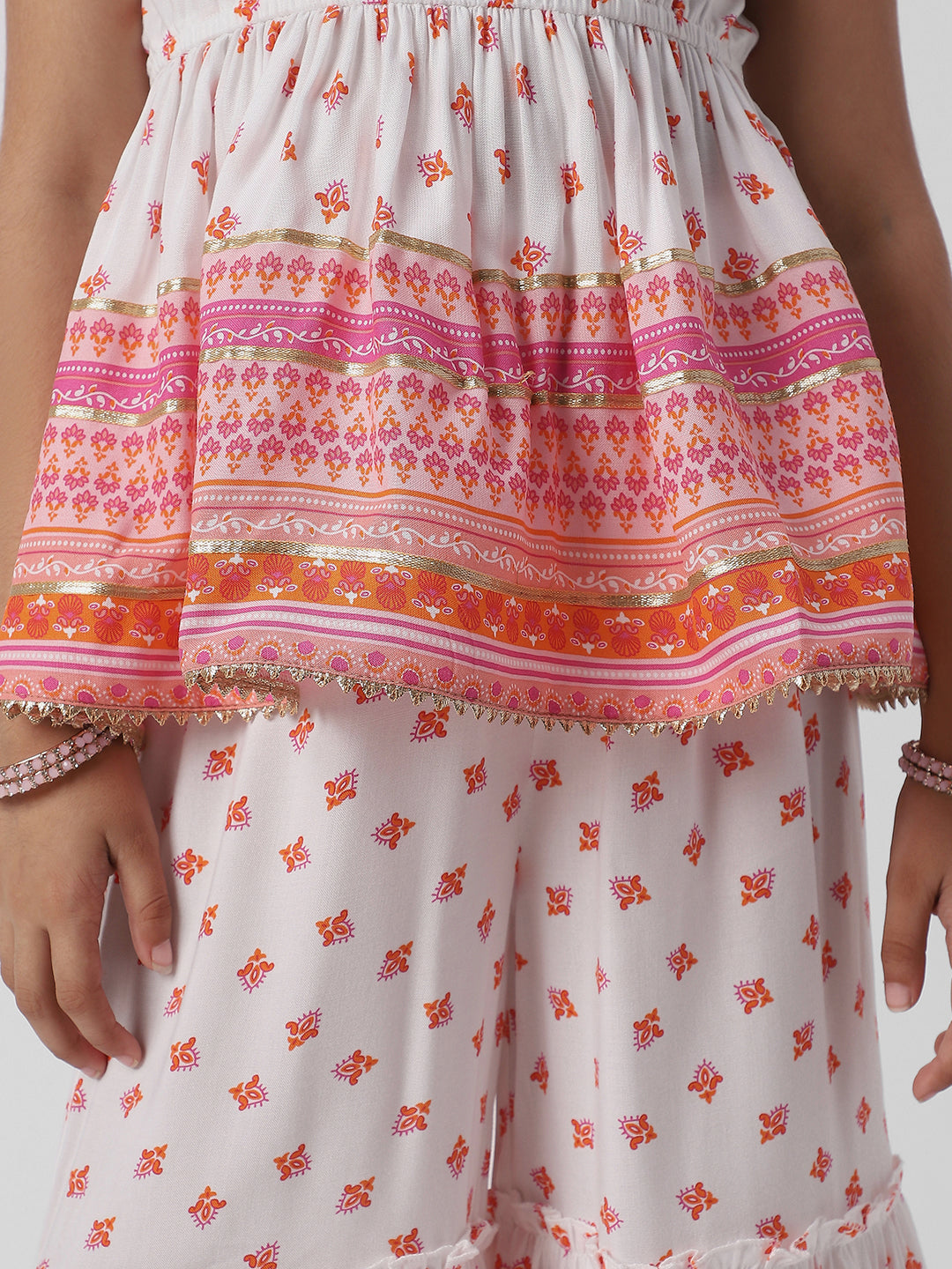 Nautinati Girls Block Print Fusion Set With Tassels, Gota Trims and Flared Silhouette
