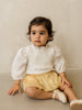 Nautinati White Embroidered Top And Gold Pleated Foil Skirt Set For Girls