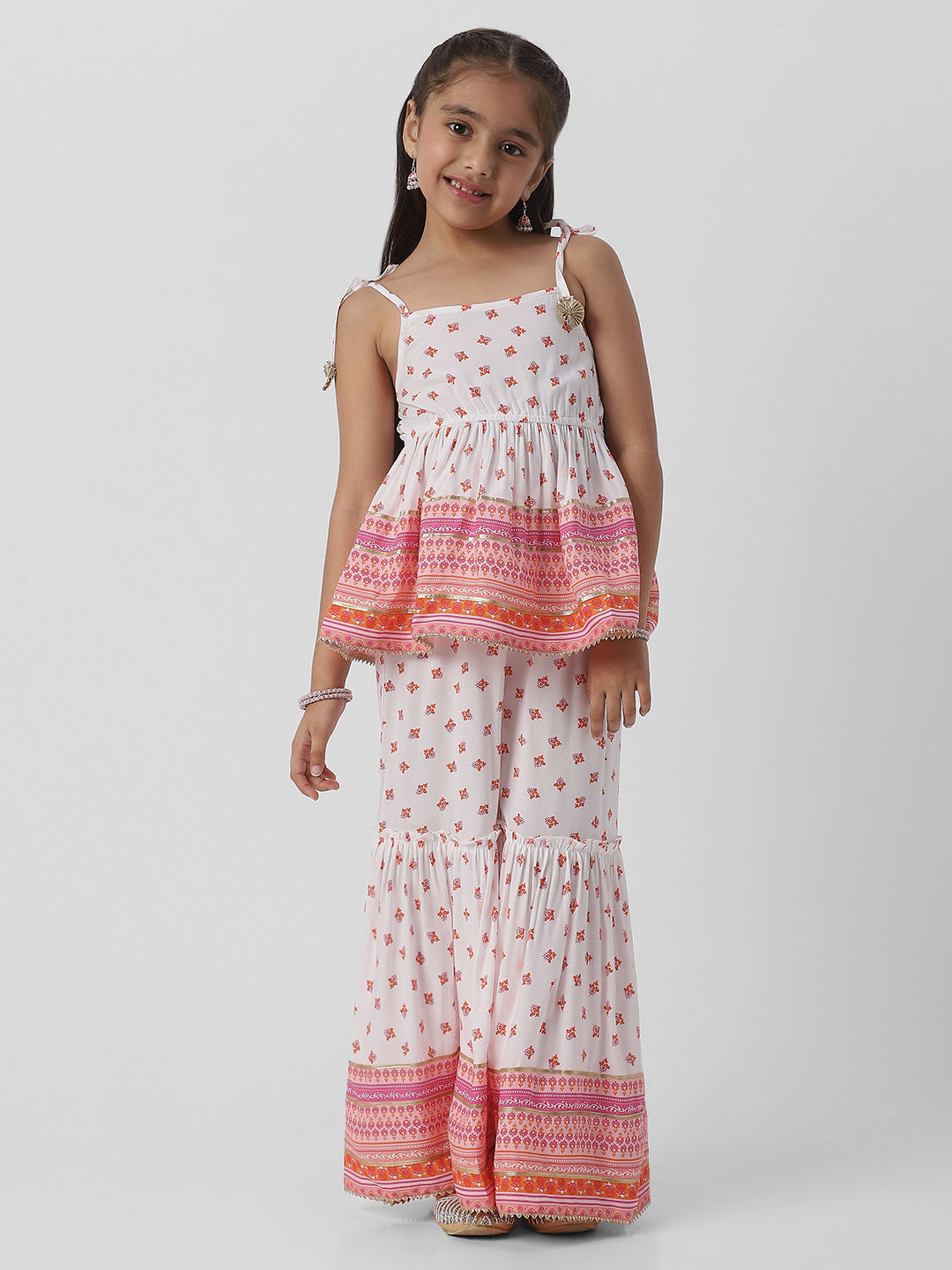 Nautinati Girlsâ€™ Block Print Fusion Set With Tassels, Gota Trims and Flared Silhouette